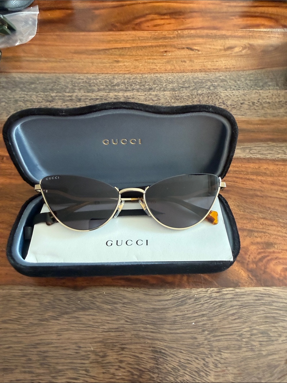 Gucci Gold-Trim Black Cat-Eye Sunglasses